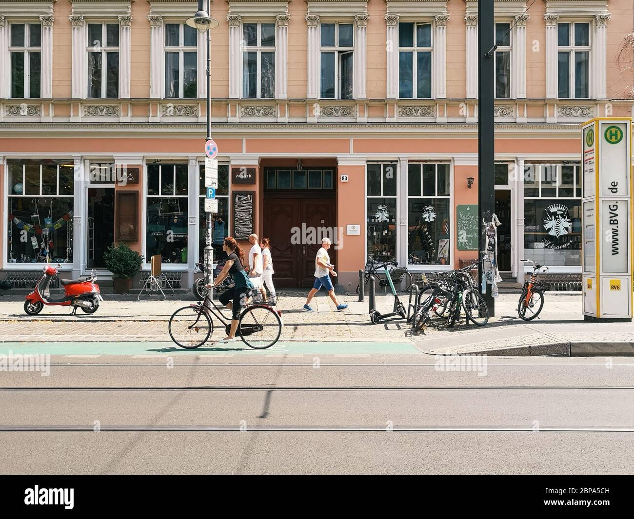 Berlin, Germany - July 27, 2019: Street scene with cyclist in Scheunenviertel quarter in Berlin Mitte. It is one of oldest and most charismatic neighb Stock Photo
