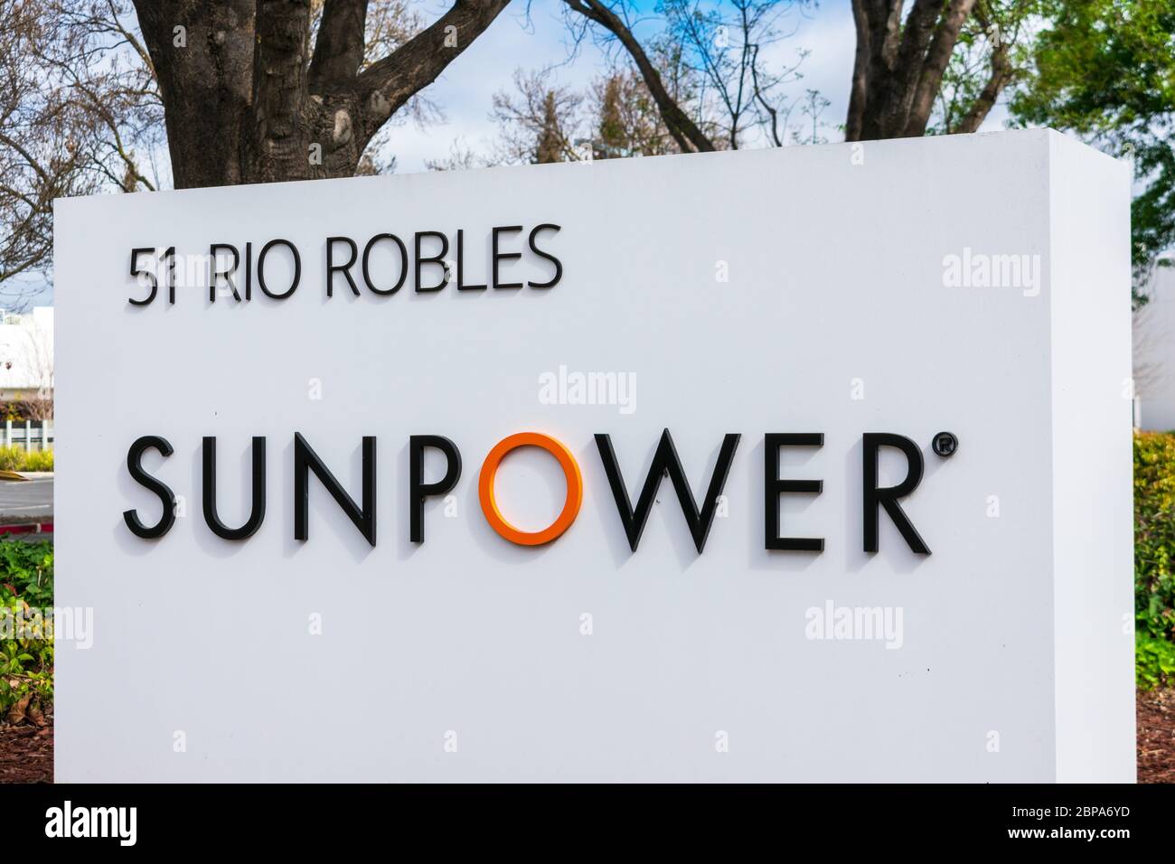 SunPower sign at solar energy company HQ. SunPower Corporation designs and manufactures crystalline silicon photovoltaic cells and solar panels - San Stock Photo