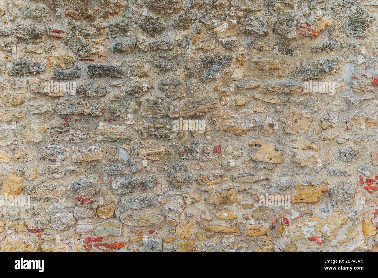Old stone wall as a background or pattern Stock Photo