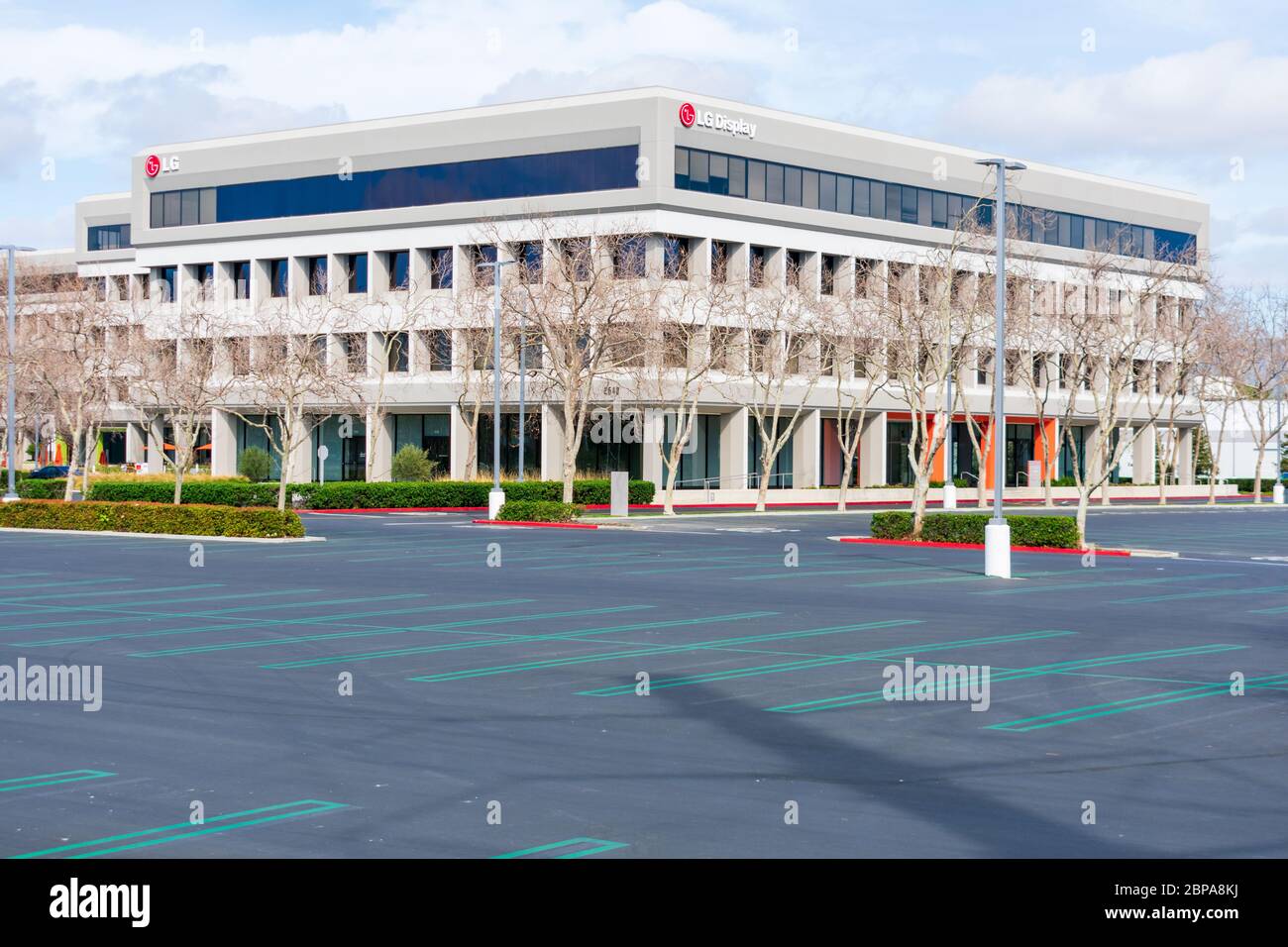 Empty parking lot of LG headquarters campus in Silicon Valley. Employees work remotely to prevent risk of coronavirus outbreak spreading worldwide - S Stock Photo
