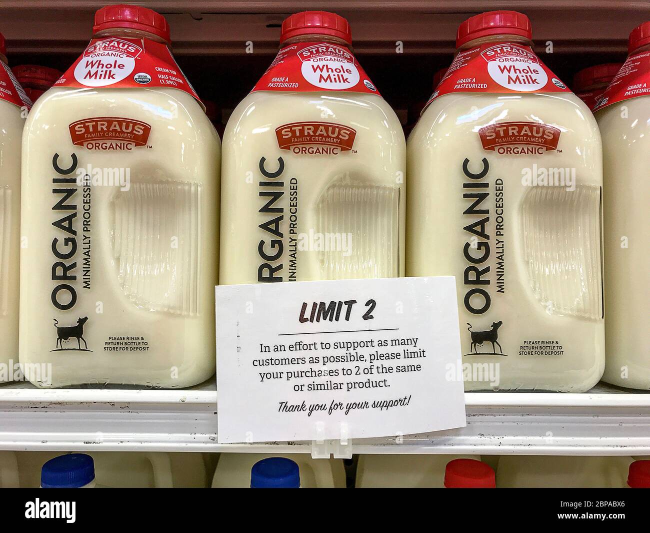 Sign informing customers that store places purchasing limits on dairy products to prevent food hoarding during coronavirus outbreak - San Jose, Califo Stock Photo