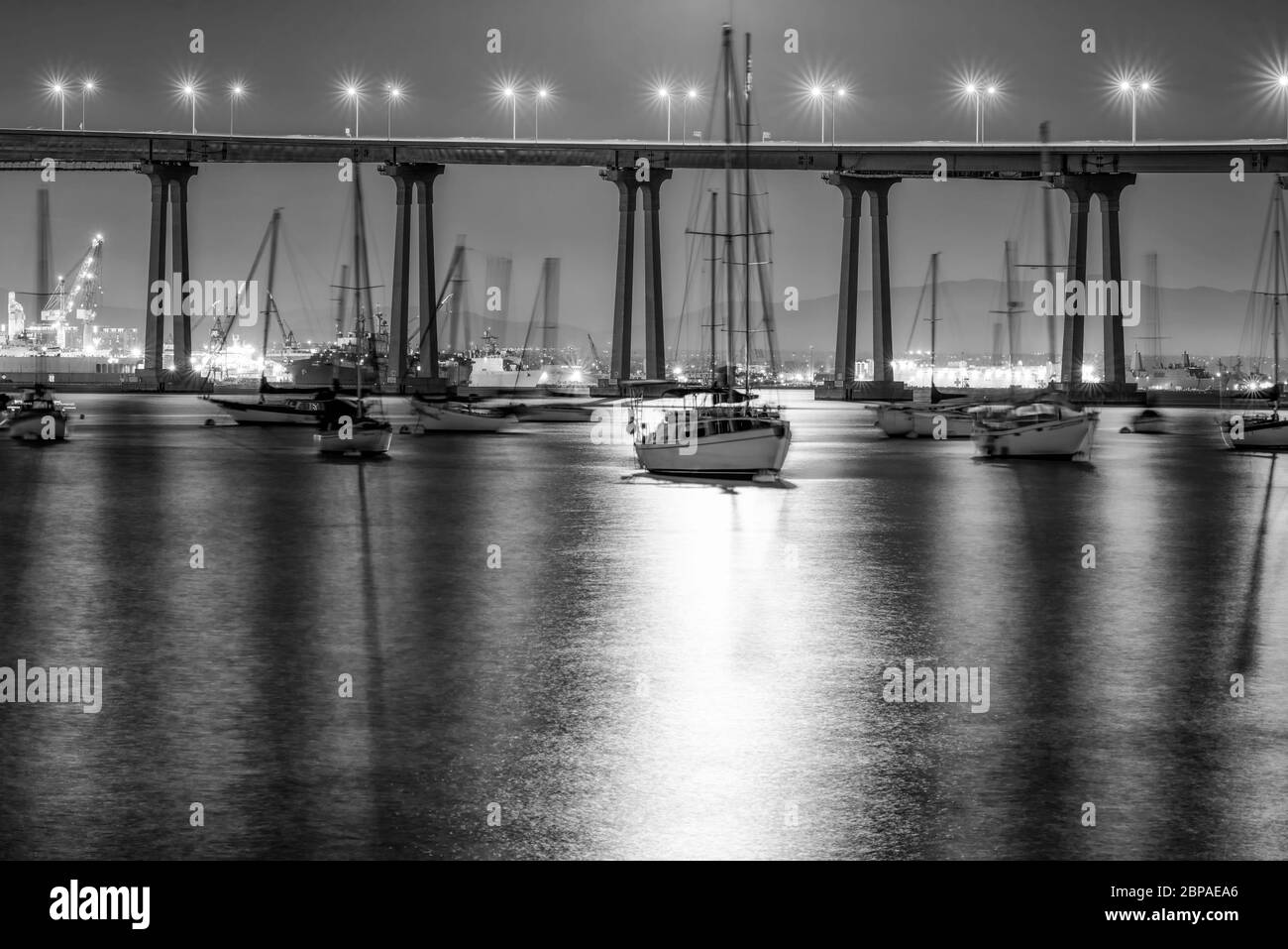 The Coronado Bridge and San Diego Harbor on a moonlit night, Photographed in Coronado, California, USA. Stock Photo