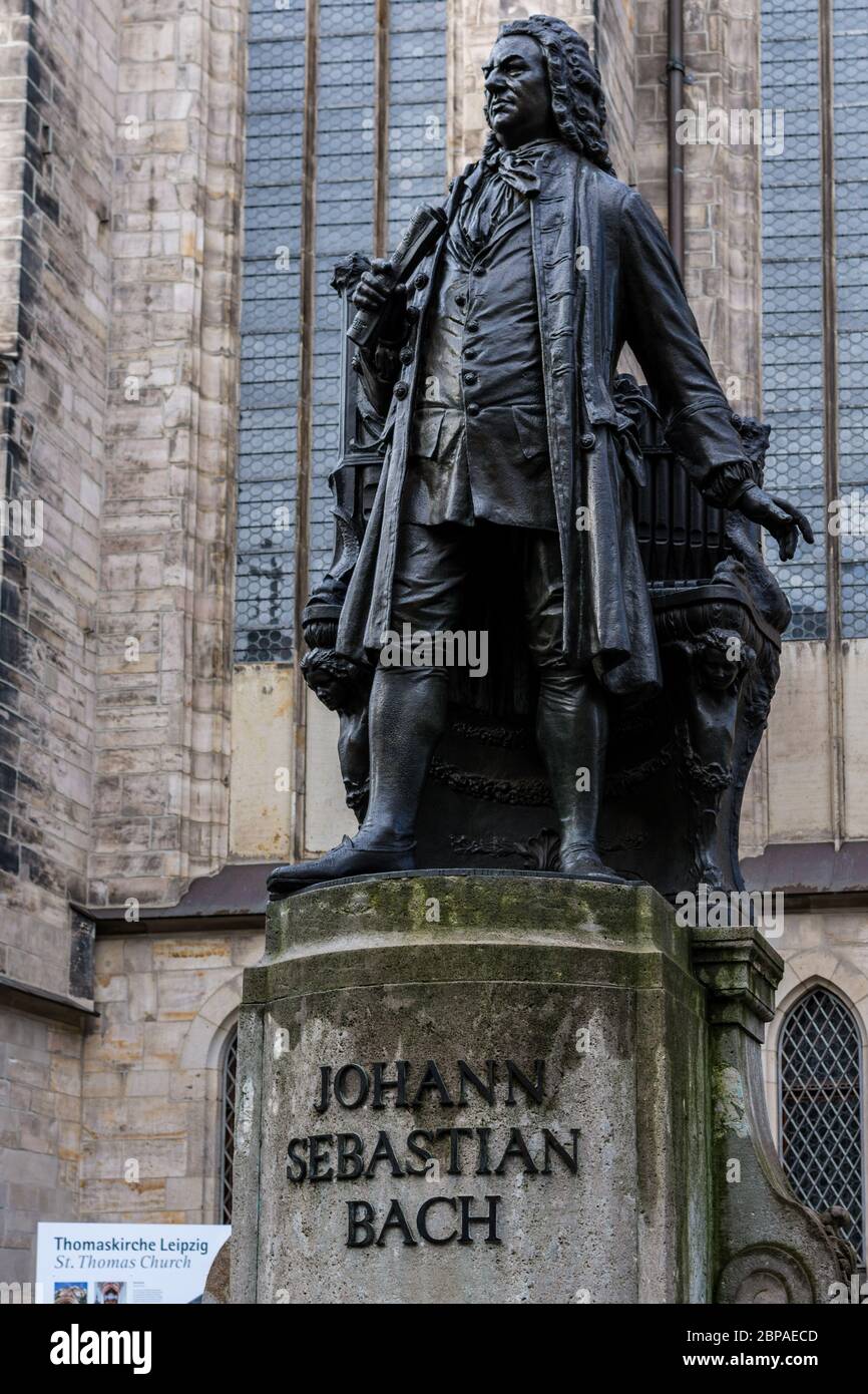 Leipzig / Germany - February 24, 2017: New Bach monument in Leipzig, Statue of Johann Sebastian Bach in front of the St. Thomas Church (Thomaskirche) Stock Photo