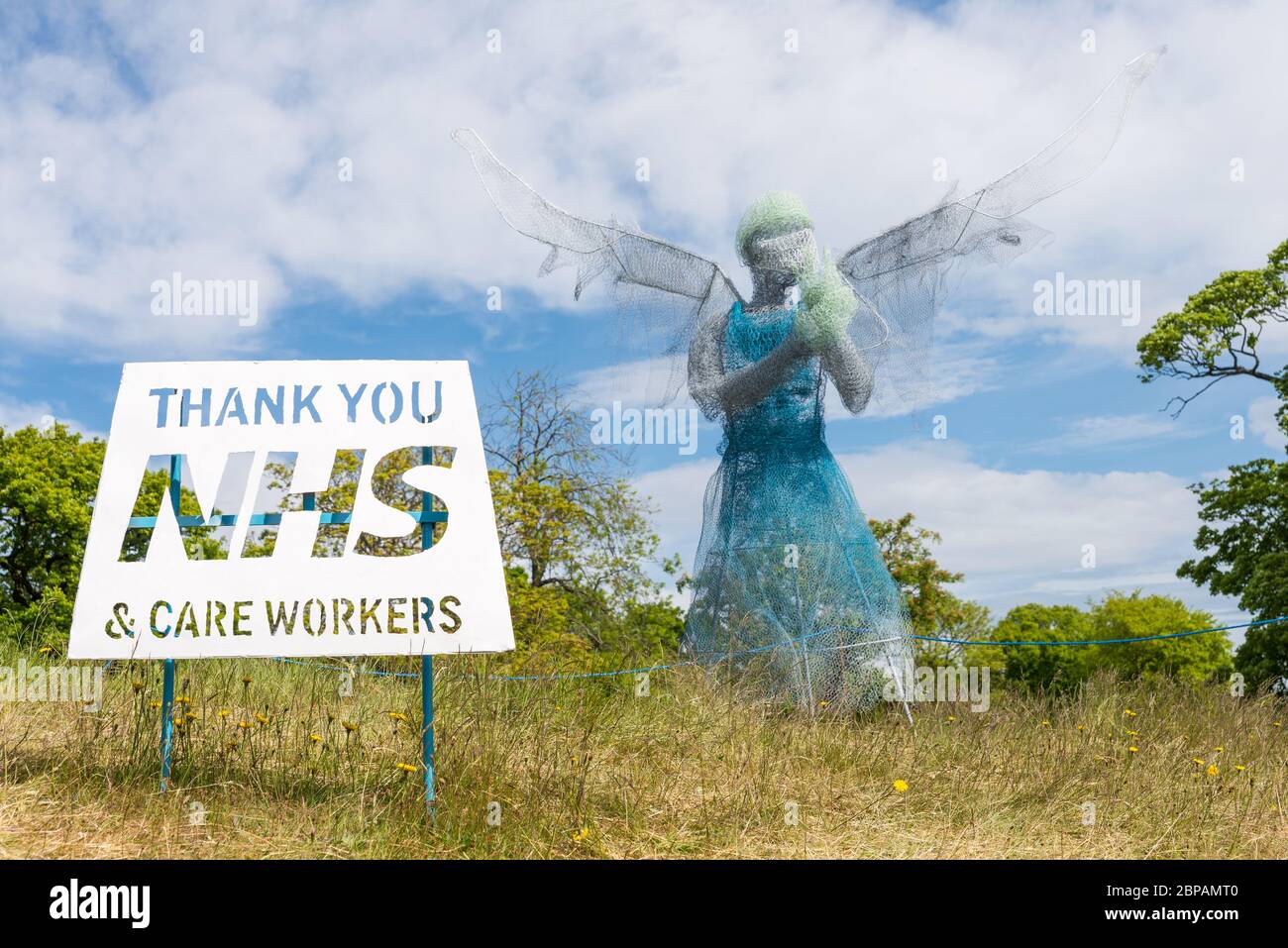 'Wings and Scrubs' model of a healthcare worker made by local artist Luke Perry from chicken wire and mesh on display in Lightwoods Park,Bearwood Stock Photo