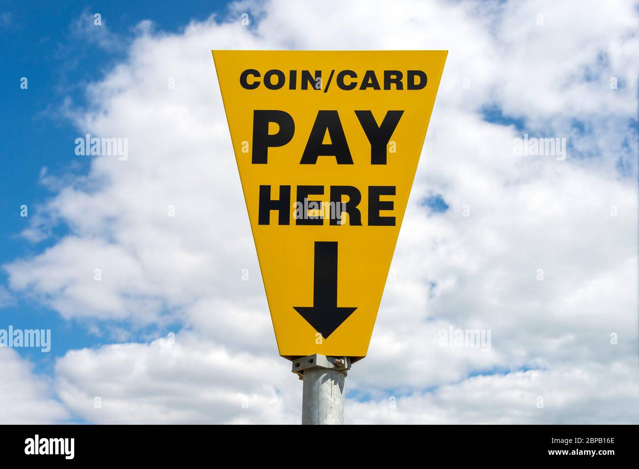 coin / card, pay here sign in an outdoor car park Stock Photo