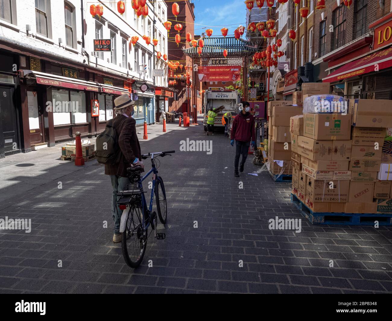 London. UK. May the 18th 2020 at noon. Wiew of Essential Workers in China Town. Stock Photo