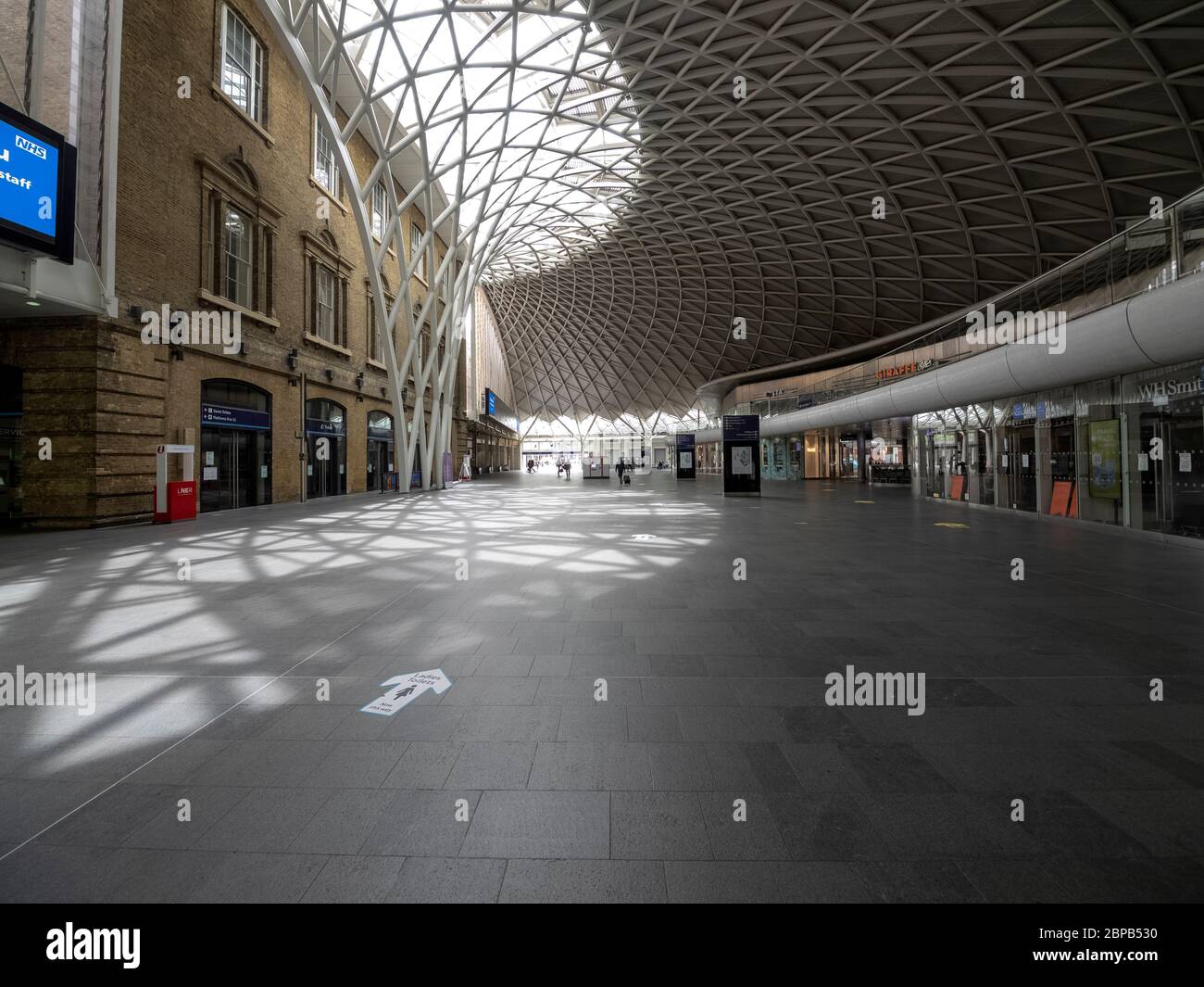 London. UK. May the 17th 2020 at lunch time. Wide view angle of King’s Cross Railway Station Hall during the Lockdown. Stock Photo