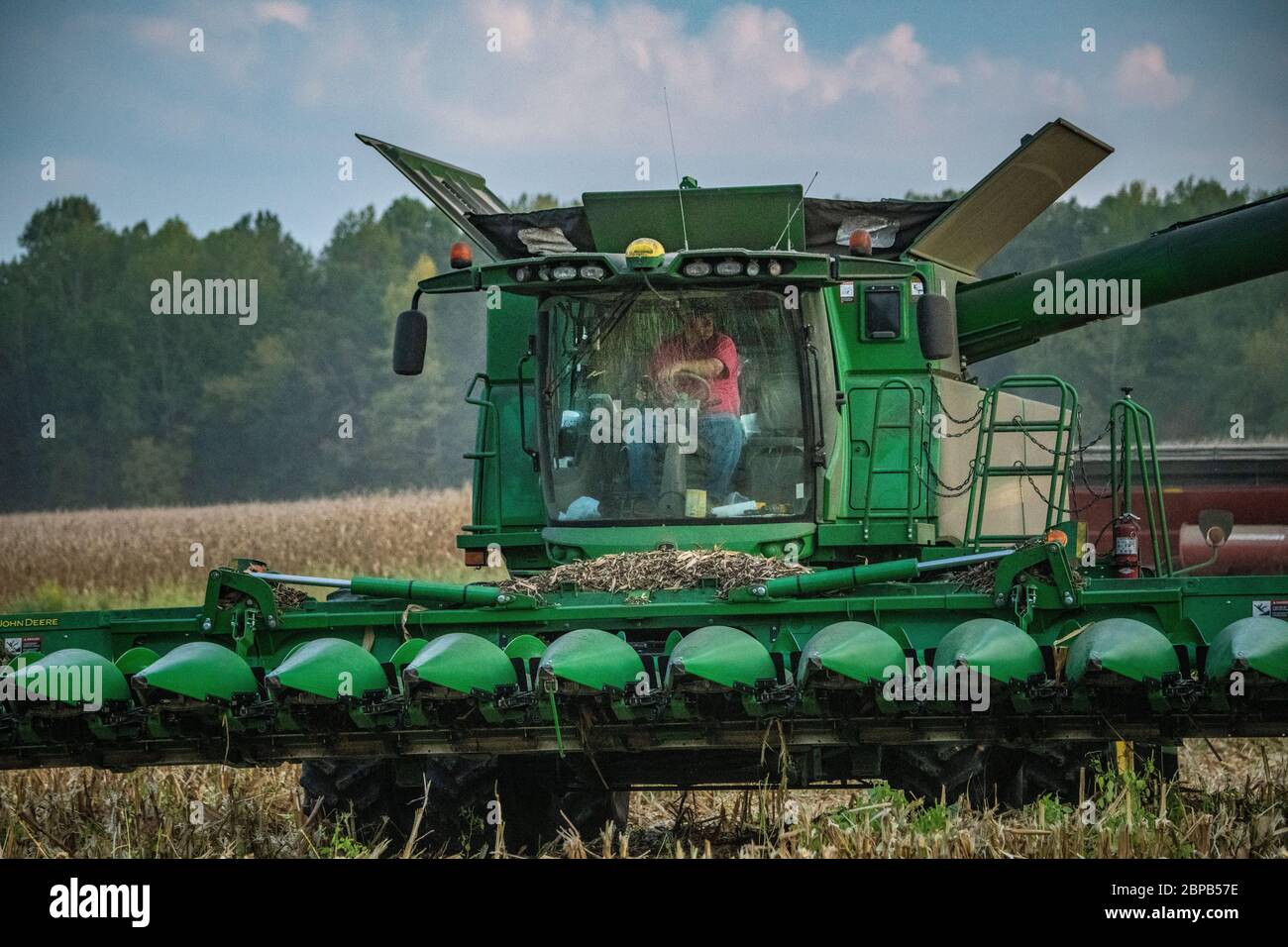 David Renfroe uses a GPS directed harvester to harvest the corn crop at his family farm September 18, 2019 in Carroll County, Tennessee. The farm utilizes conservation practices developed with the USDA to balance land stewardship and production. Stock Photo