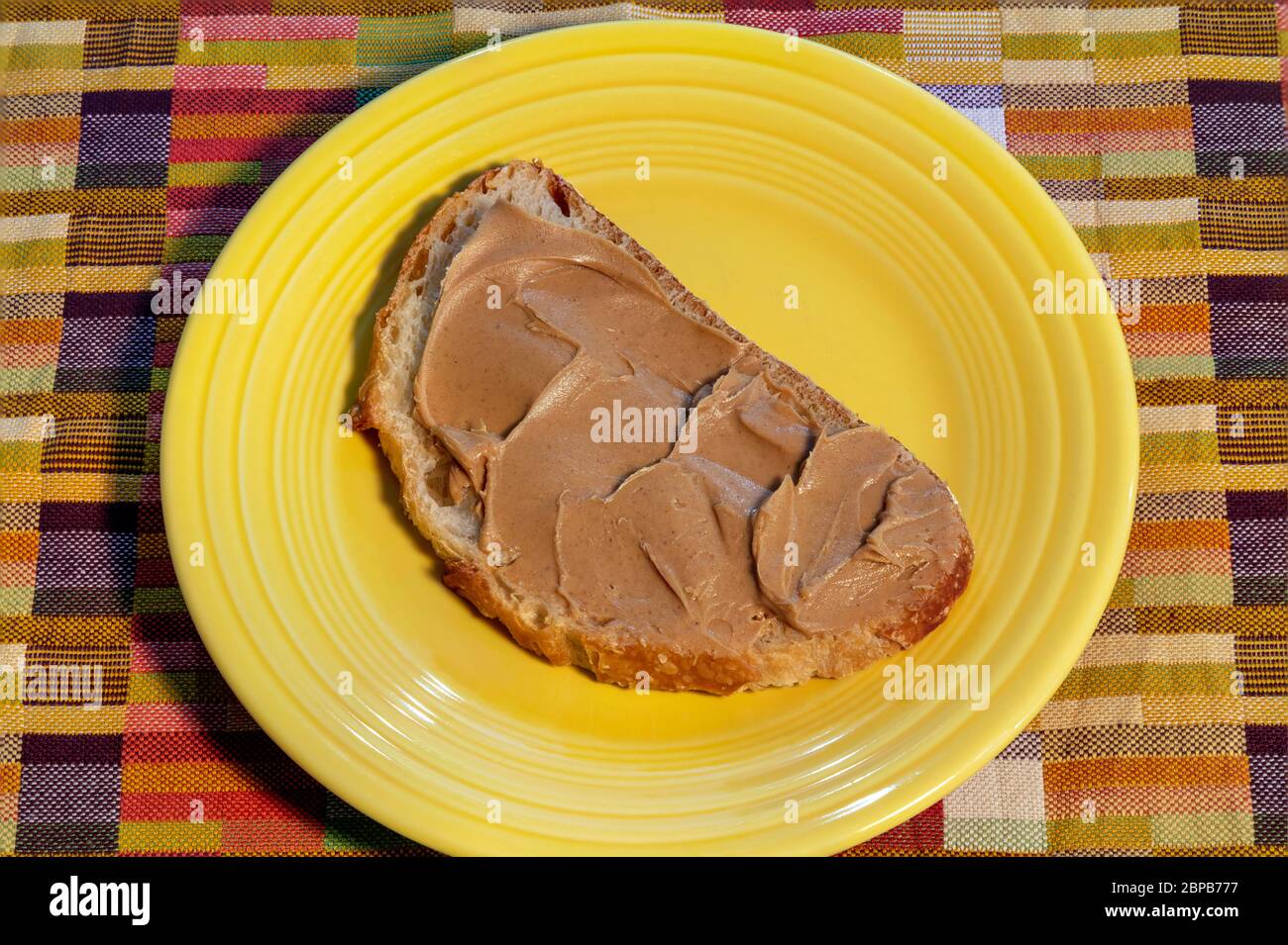 Slice bread with creamy Peanut butter, by James D Coppinger/Dembinsky Photo Assoc Stock Photo