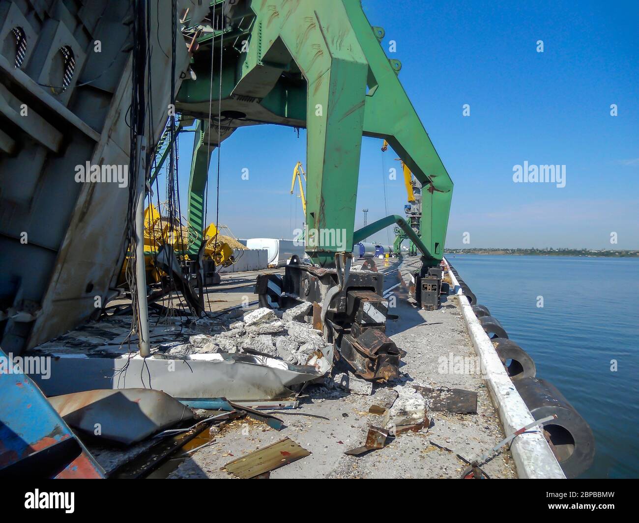 Harbor Crane collapse. Damages port crane after a strong storm. Harbor crane with engine room