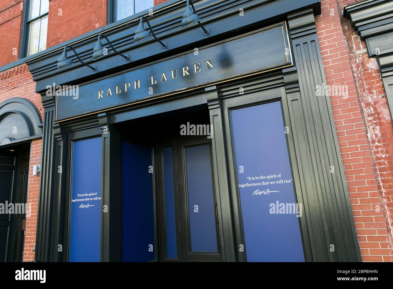A logo sign outside of a boarded up and closed Ralph Lauren retail store  location in Washington, D.C., on May 9, 2020 Stock Photo - Alamy