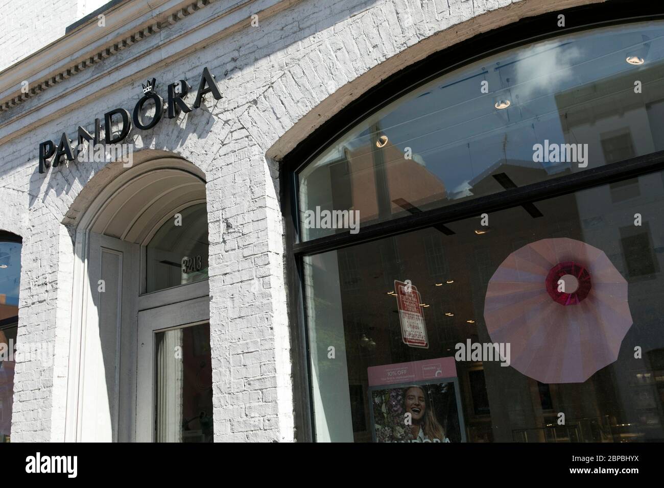 A logo sign outside of a Pandora retail store location in Washington, D.C.,  on May 9, 2020 Stock Photo - Alamy