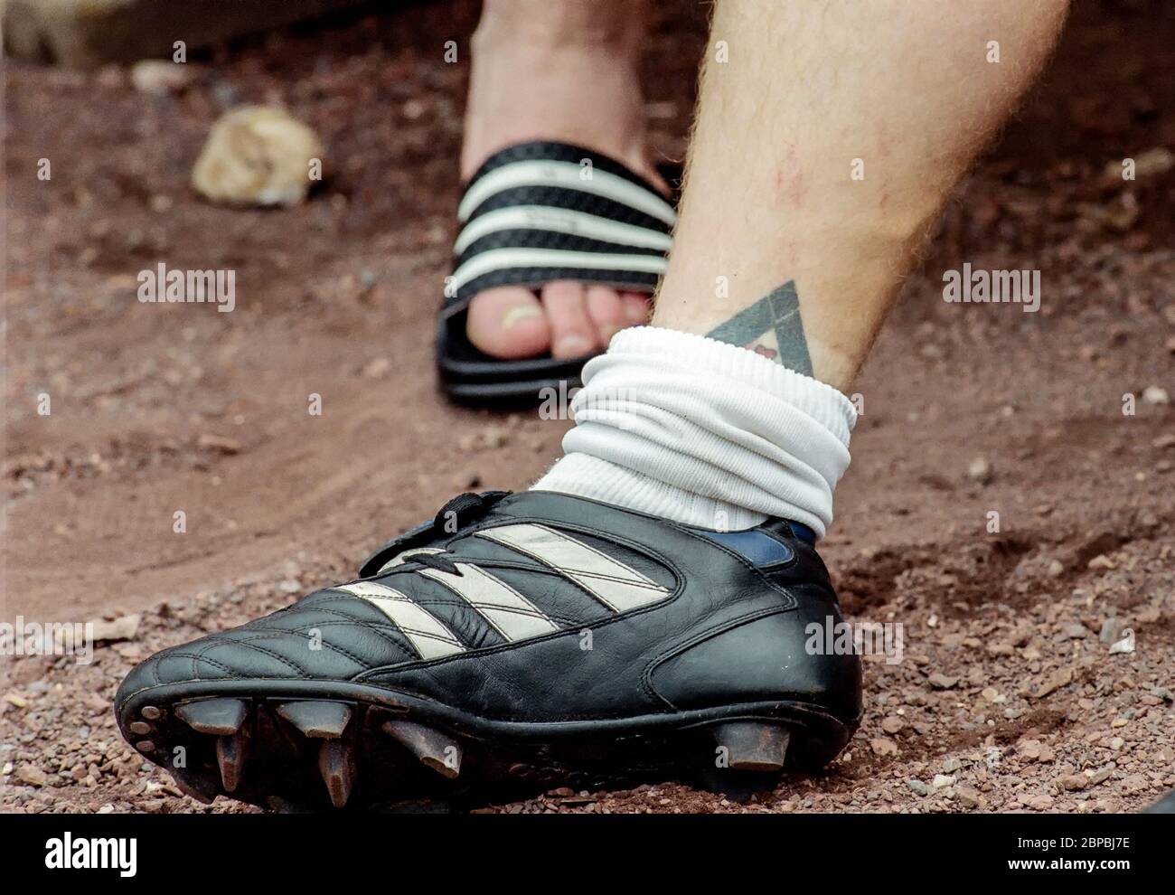 three stripe cleats