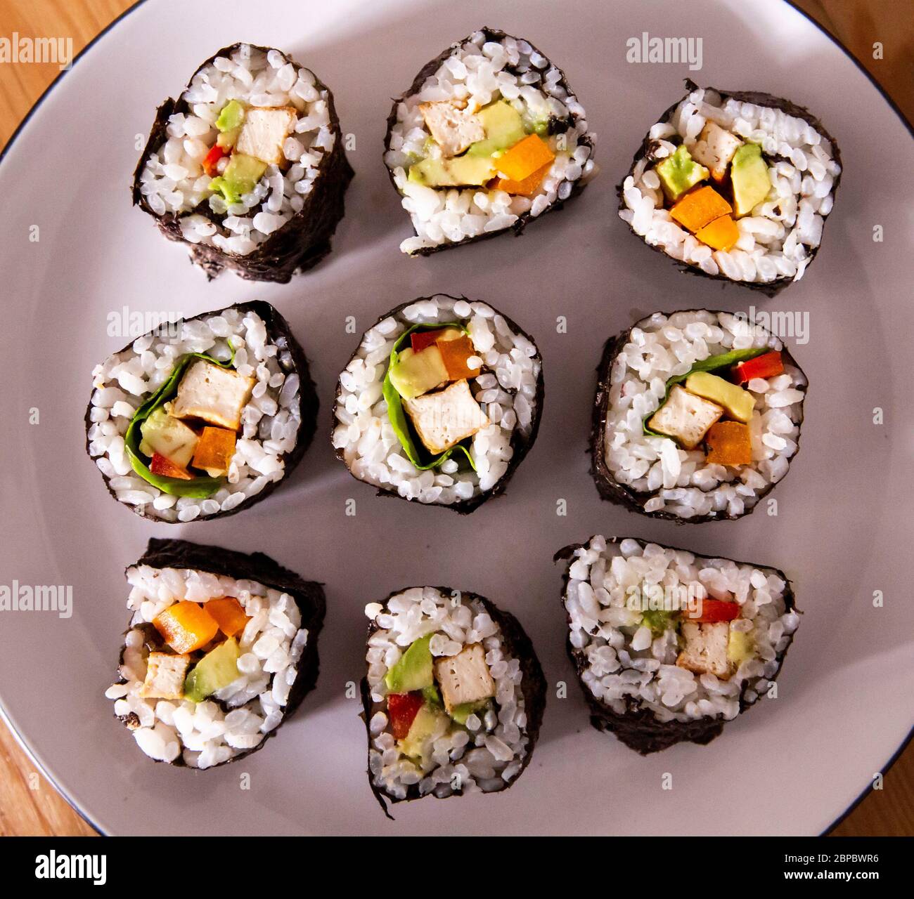 Vegan tofu sushi rolls made at home Stock Photo Alamy
