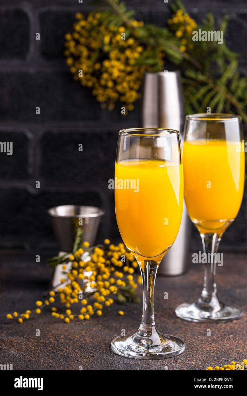 Mimosa cocktail with orange juice Stock Photo Alamy