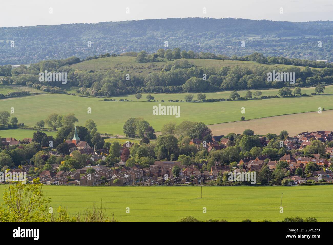 The village of South Harting and surrounding countryside as seen from Harting Down National Trust Nature Reserve, West Sussex, England, UK Stock Photo