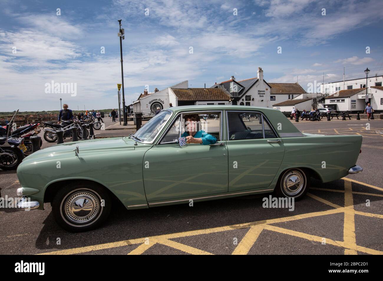 Sandra and Brian spend their first weekend since the coronavirus lockdown measures were relaxed enjoying a trip out in their FORD Zephyr 1963, Dorset. Stock Photo
