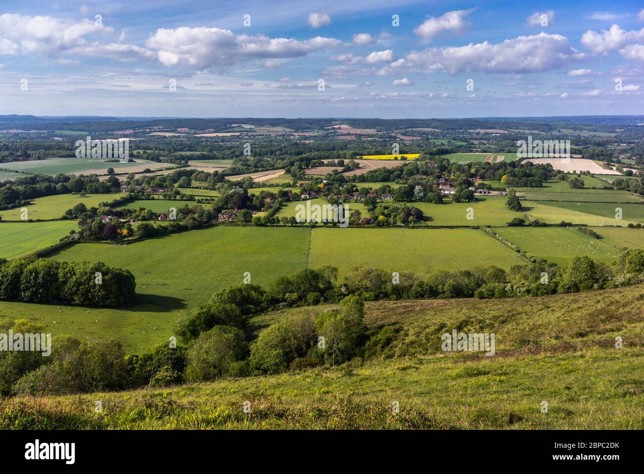 View from Harting Down National Trust Nature Reserve towards East Harting village and surrounding countryside as seen from , West Sussex, England, UK Stock Photo