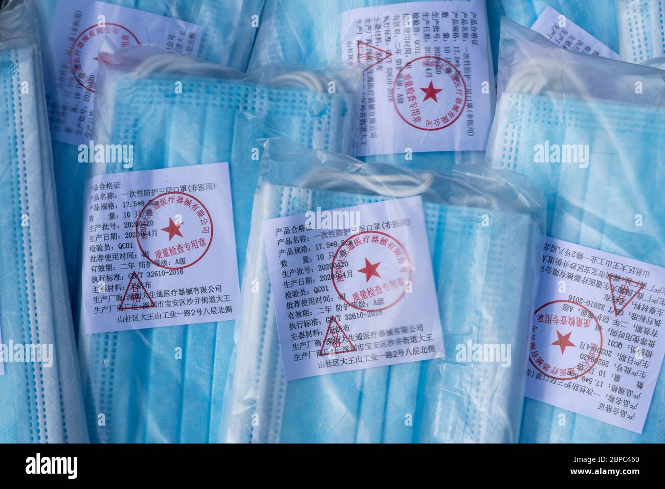 Packs of face masks from China during the coronavirus (Covid-19) pandemic, May 2020 Stock Photo