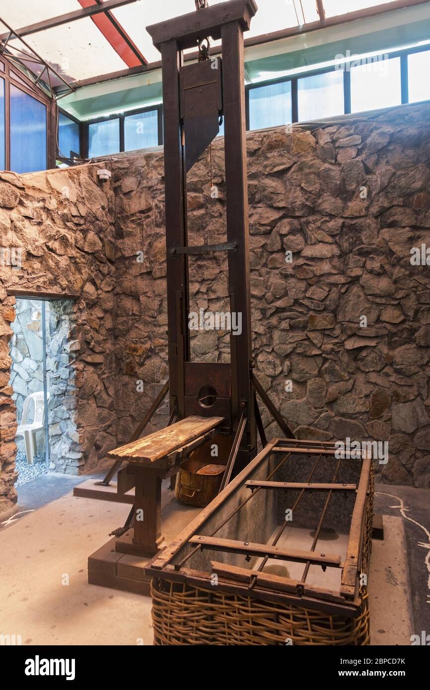 Model of Old Guillotine in War Remnants Museum Torture Chamber, Ho Chi Minh City (formerly Saigon), Vietnam Stock Photo