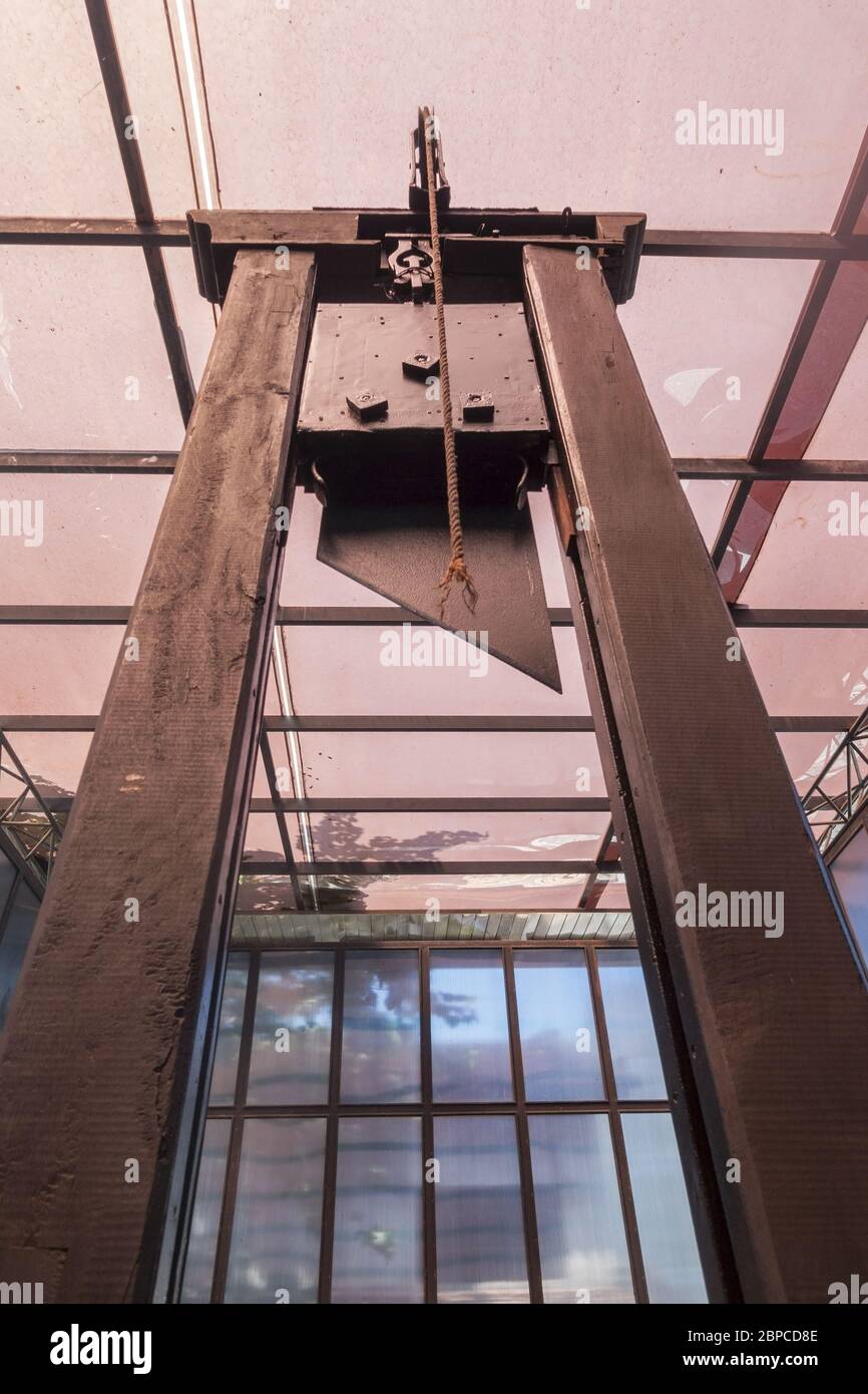 Model of Old Guillotine in War Remnants Museum Torture Chamber, Ho Chi Minh City (formerly Saigon), Vietnam Stock Photo