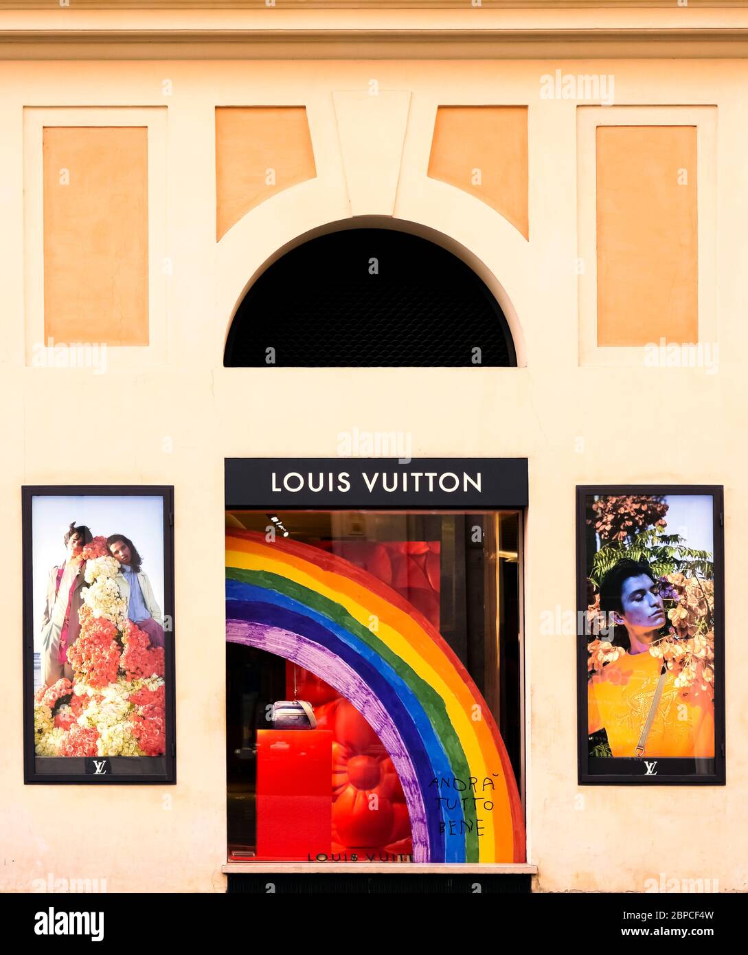 Louis Vuitton flagship store during the lockdown for coronavirus covid 19. Luxury shopping. Rainbow 'Andrà tutto bene (everything will be all right)'. Rome at the time of Covid 19. Italy, Europe, European Union, EU. Stock Photo