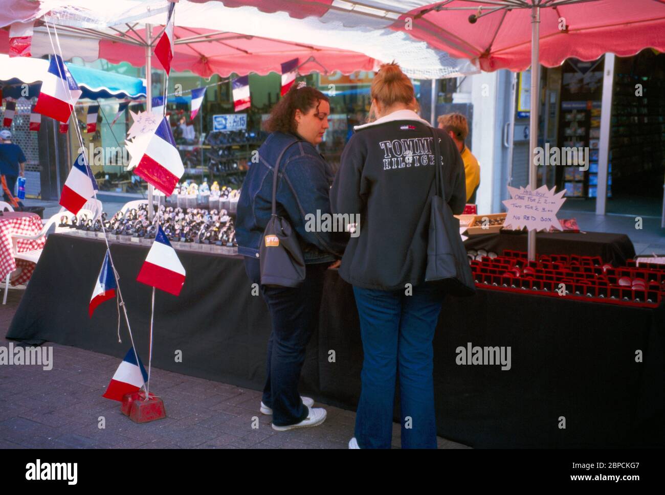 Sutton Surrey England Two Women lokking at Jewellery Stall at French Market Stock Photo