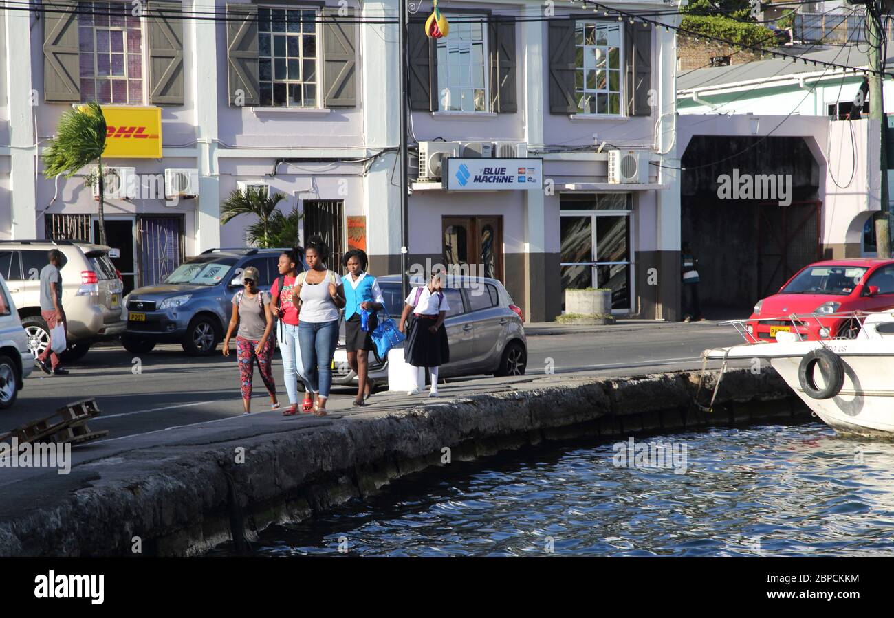 St George's Grenada Carenage Harbour People walking along Waterfront Stock Photo