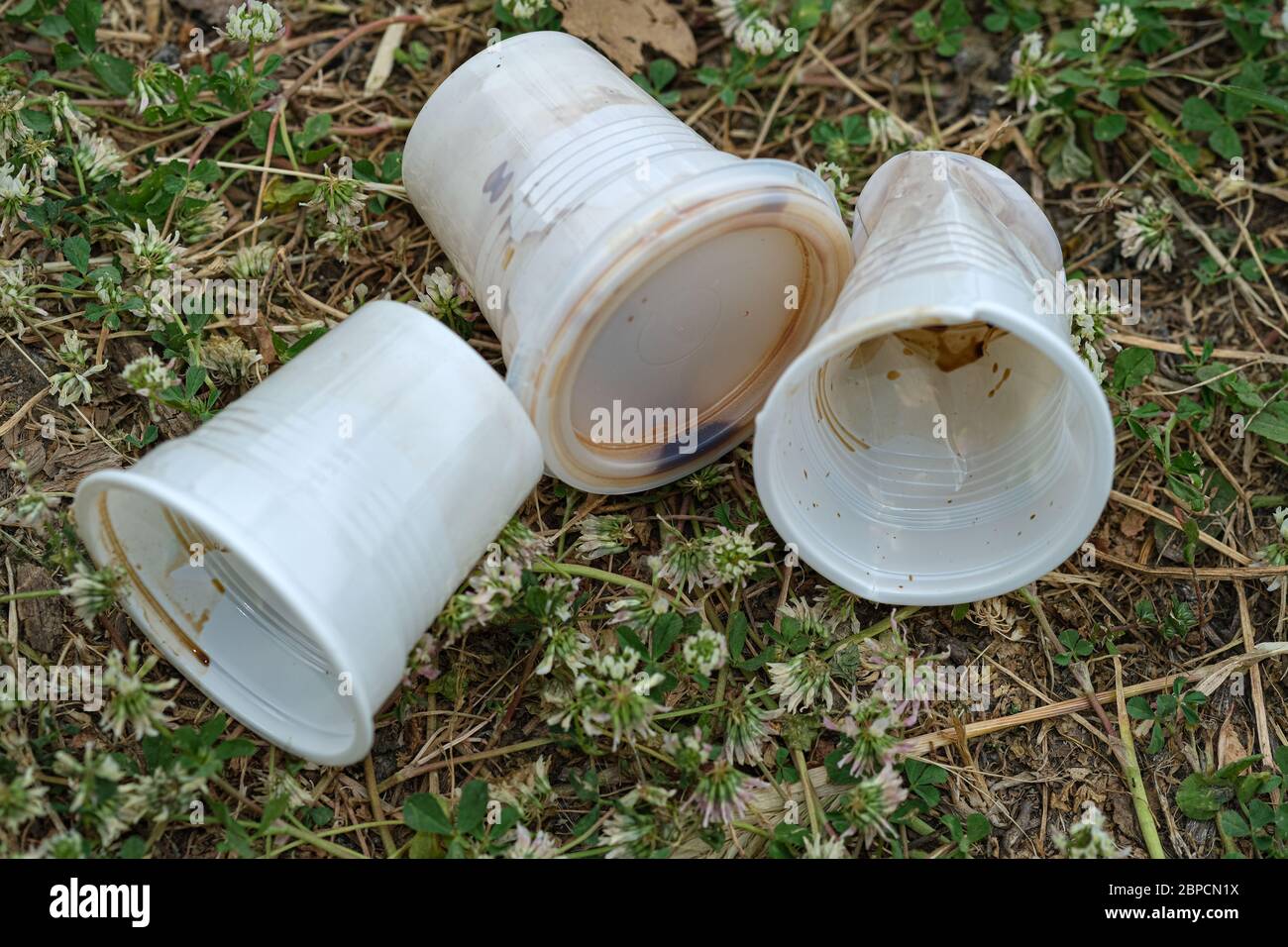 Take away plastic coffee used glass discharged waste,dirty disposable pollution Stock Photo
