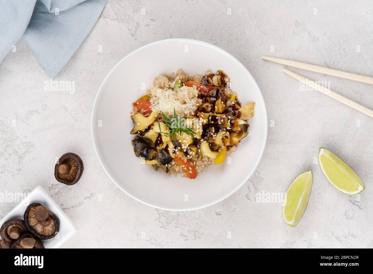 Rice with seafood, parmesan and fresh tomatoes. Stock Photo