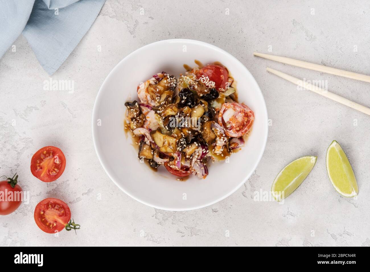 Rice with shrimp, squid, fresh tomatoes and onions. Asian recipe. Stock Photo