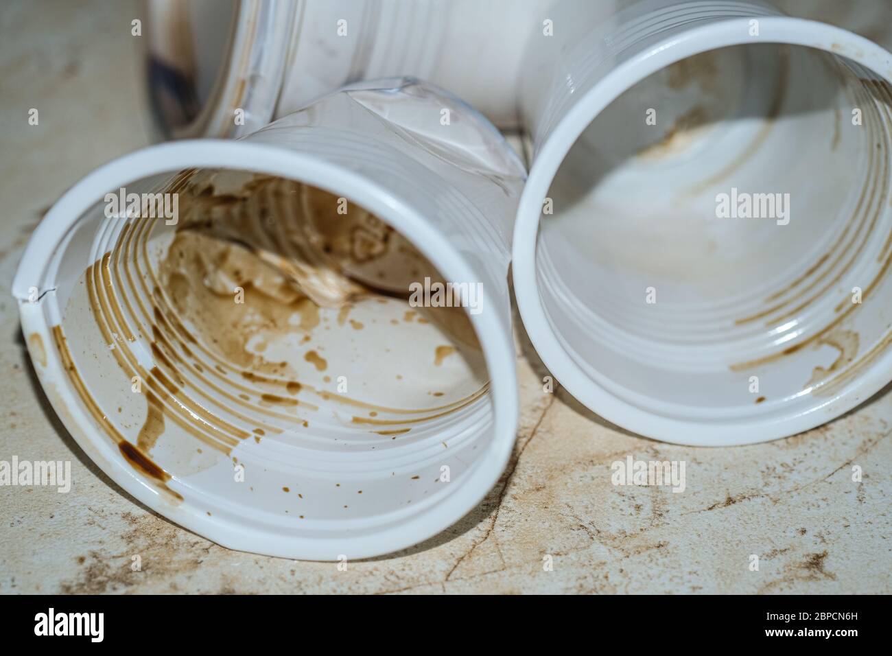 Closeup of dirty Take away plastic coffee cups discharged waste,dirty disposable pollution Stock Photo