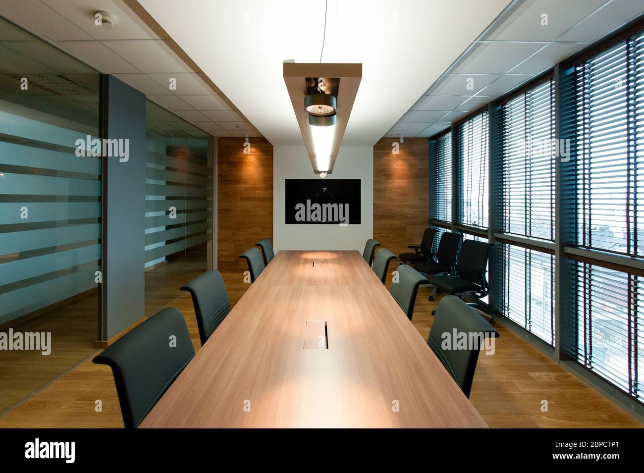 Empty office conference room interior with table and chairs Stock Photo