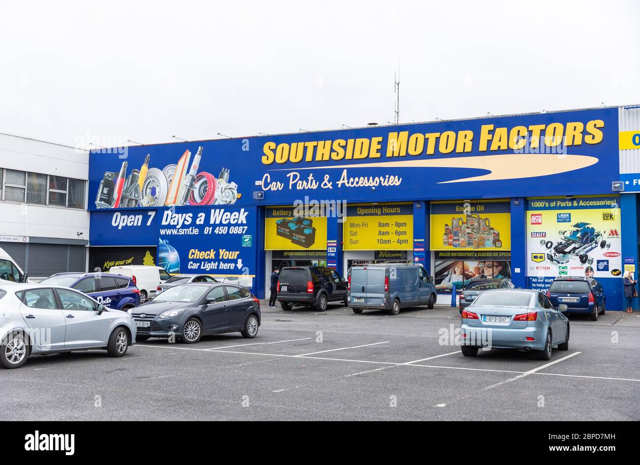 (200519) -- DUBLIN, May 19, 2020 (Xinhua) -- Cars park outside a car parts and accessories shop in Dublin, Ireland, May 18, 2020. Ireland on Monday entered into what it called Phase-One stage in easing the restrictions which were imposed some 50 days ago following the COVID-19 outbreak in the country. During the stage, more businesses are allowed to be reopened in the country. They include hardware stores, homeware shops, garden centers, farmers' markets, repair shops for cars, motorbikes and bicycles, and optical shops. Restaurants like McDonald's and Burger King are also permitted to prov Stock Photo