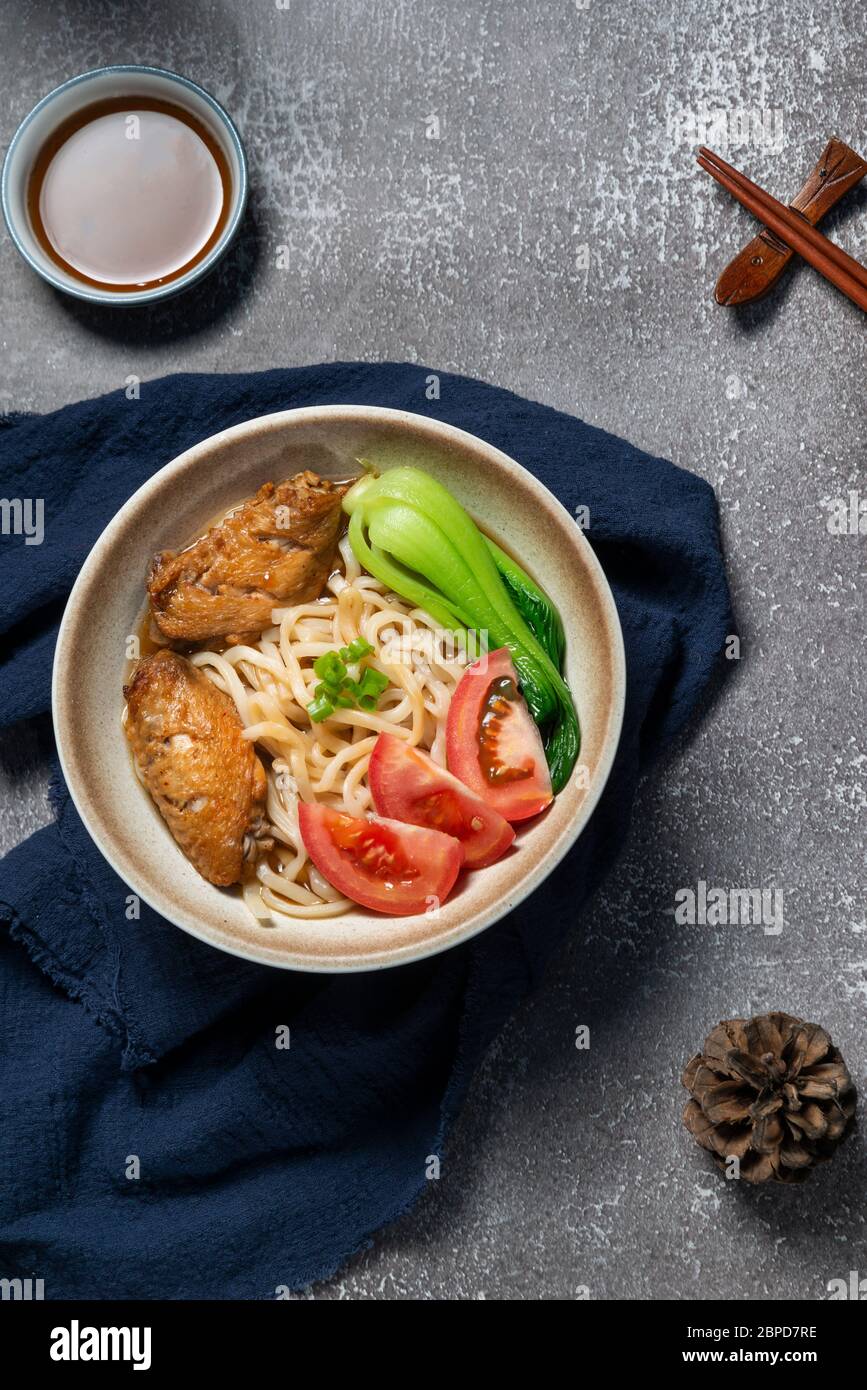 Delicious Chinese noodles with chicken wings Stock Photo Alamy