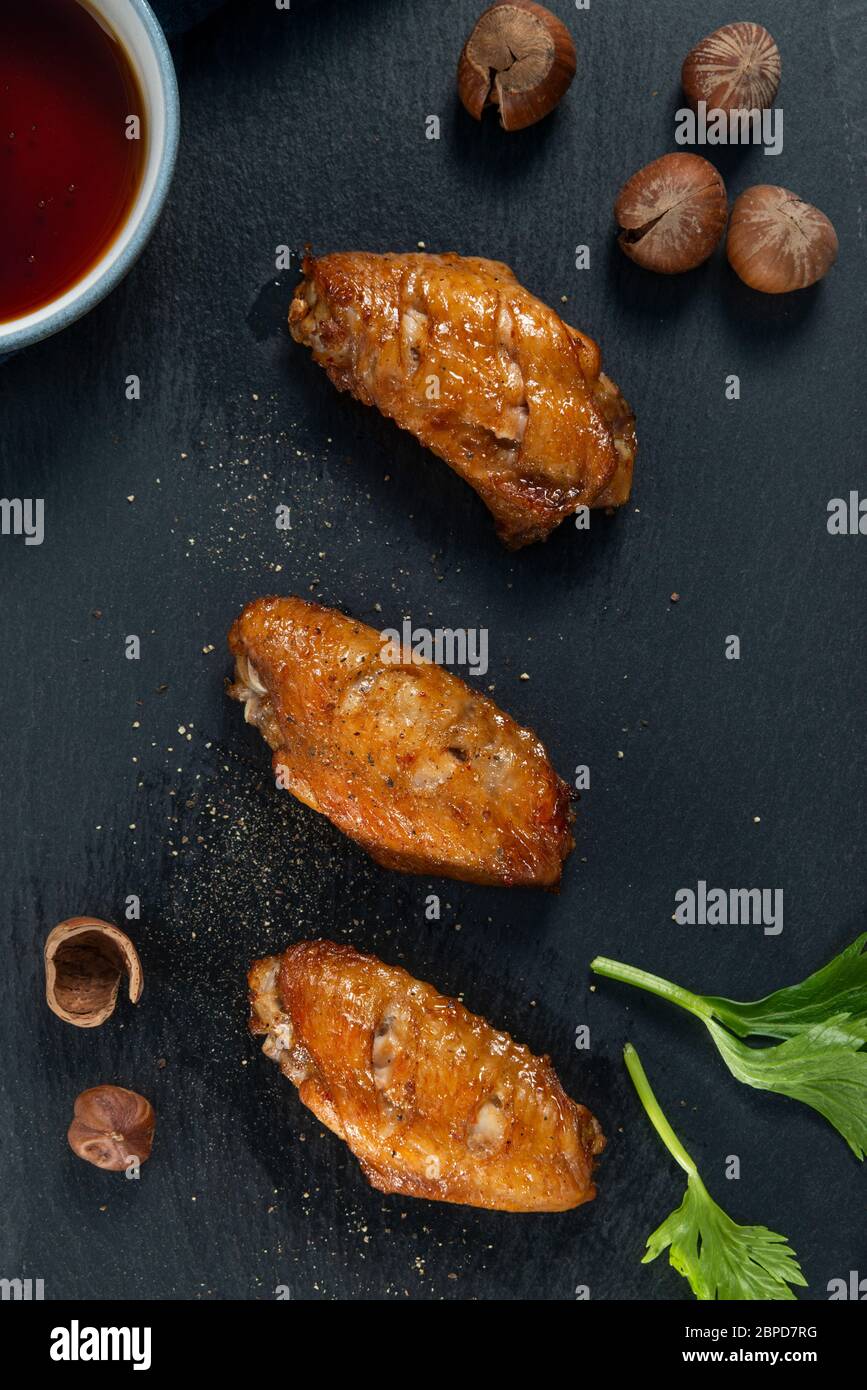 fried chicken wings with sauce Stock Photo - Alamy