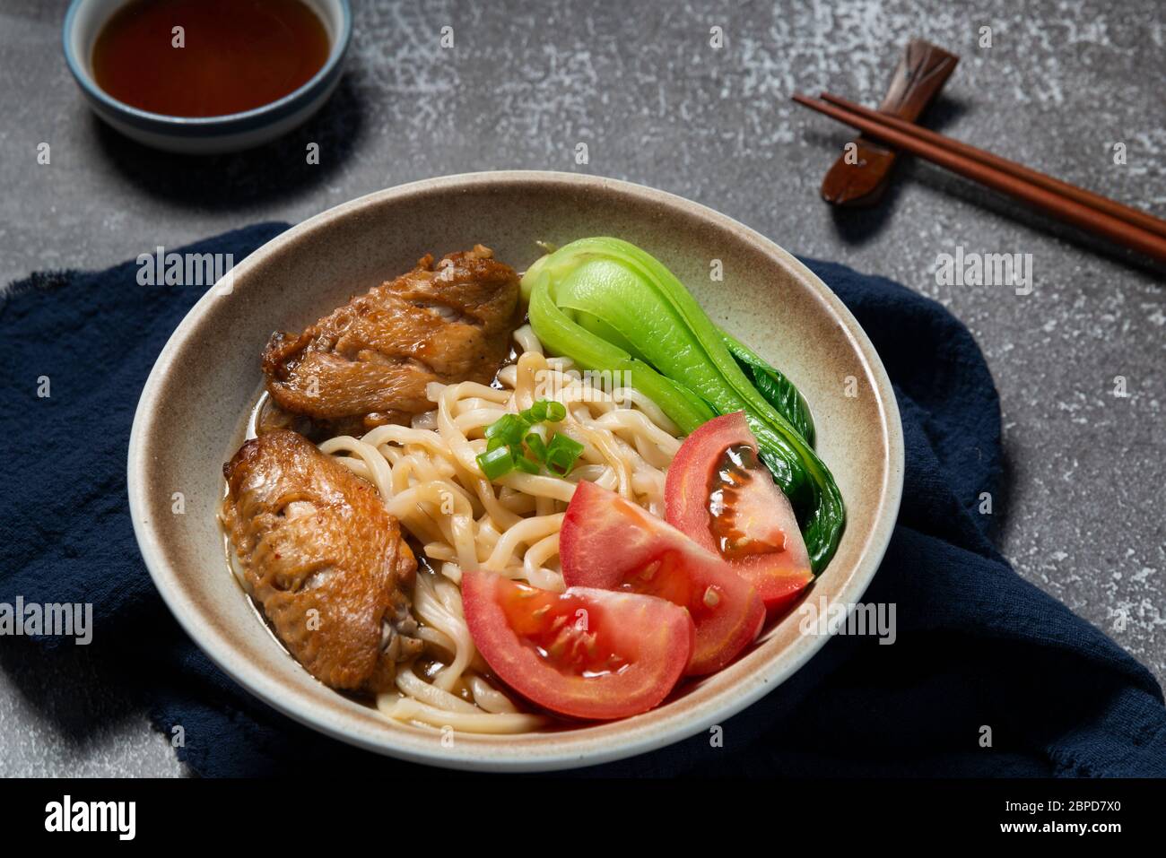 Delicious Chinese noodles with chicken wings Stock Photo Alamy