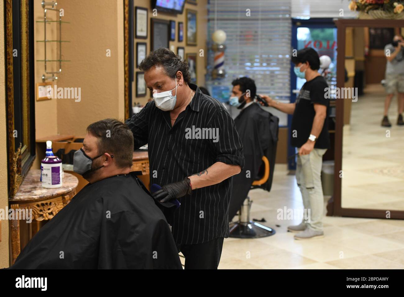 Coral Springs, FL, USA. 18th May, 2020. Barber Blanka is seen working
