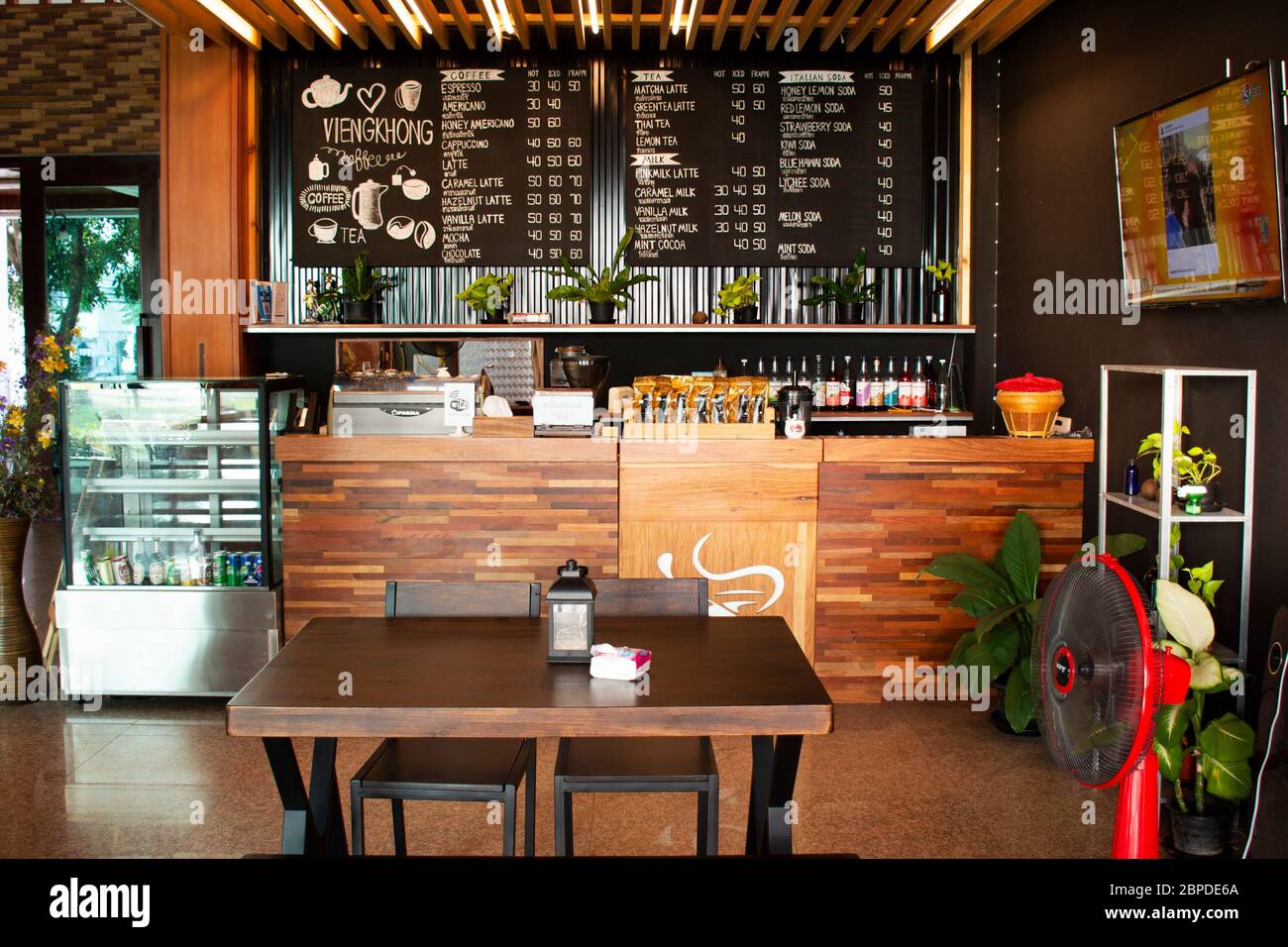 MUKDAHAN, THAILAND - OCTOBER 2 : Interior decoration furniture of cafe  coffee shop with staff barista brew make coffee serve customer at luxury  coffe Stock Photo - Alamy
