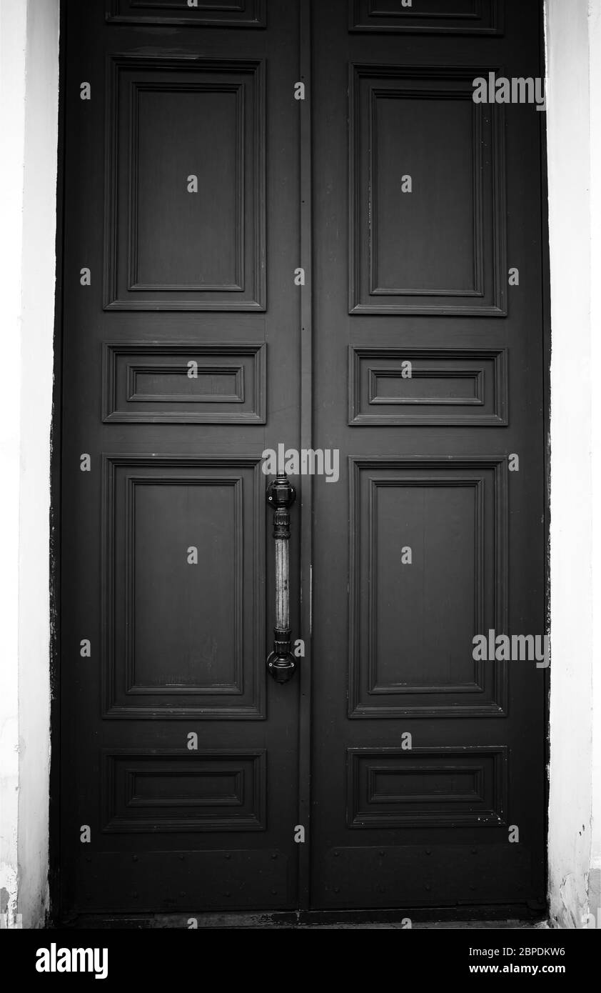 Closed black and white door architecture background Stock Photo - Alamy