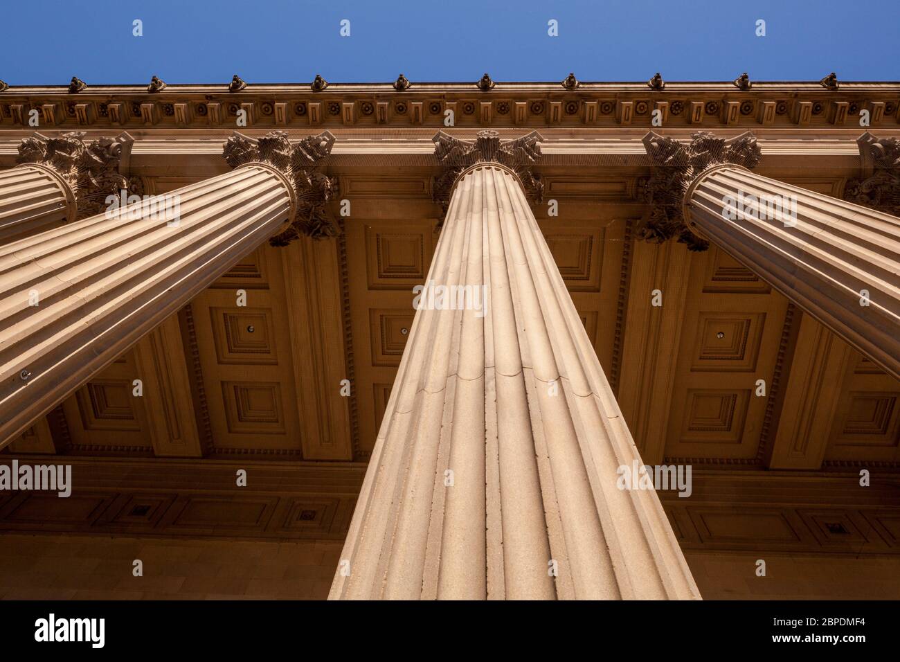 The Corinthian columns of the eastern facade of the Neoclassical Grade I listed St George's Hall in Liverpool, England Stock Photo