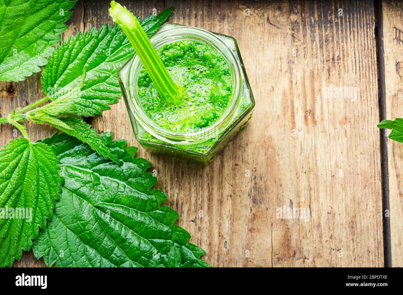 Green smoothie from nettle leaves.Green fresh healthy juice.Fresh smoothies Stock Photo