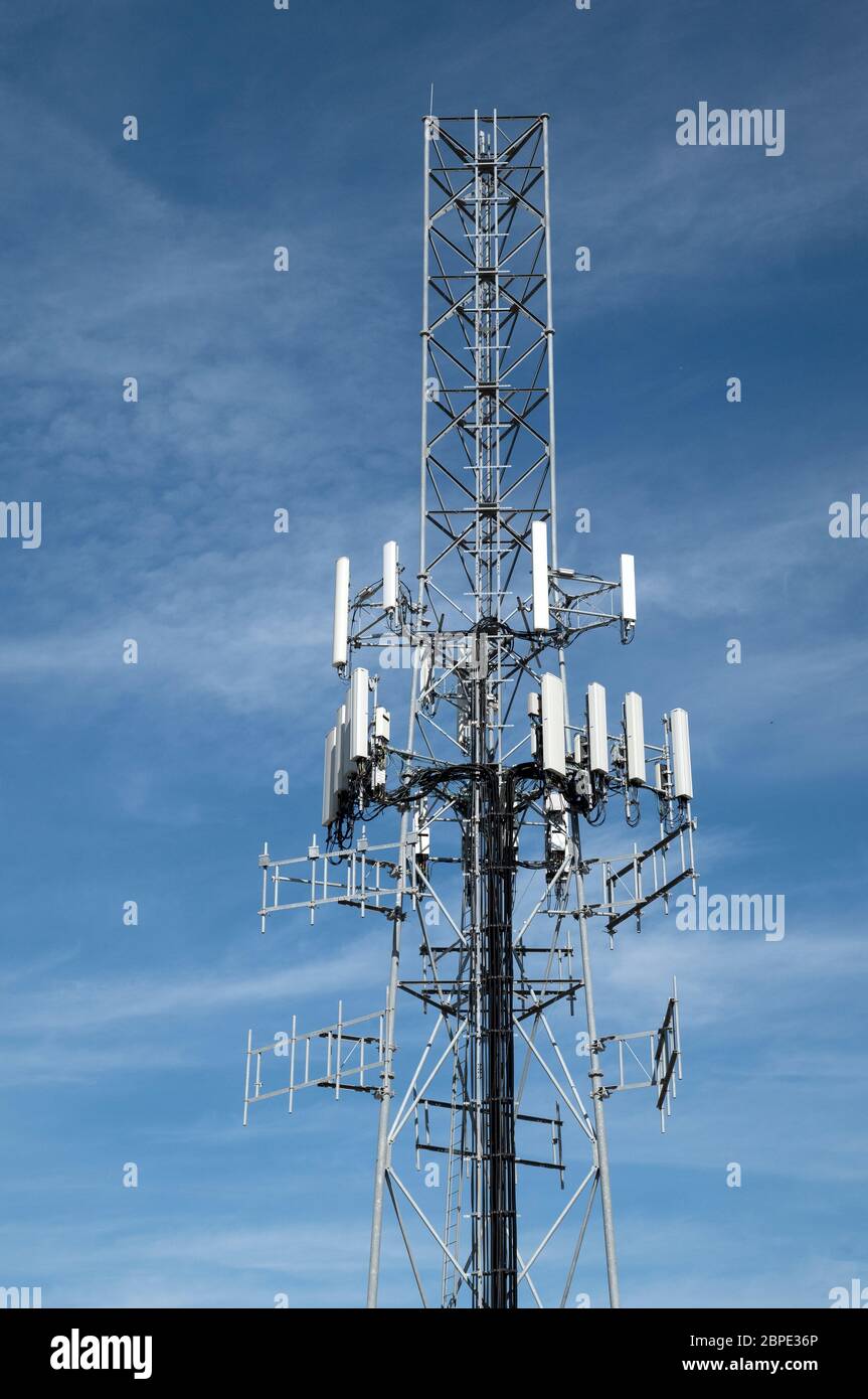 A large free standing cellular communications transmission tower Stock ...