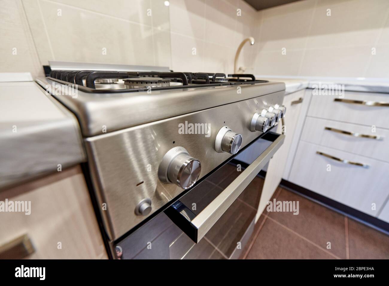 Oven on an empty kitchen in an apartment Stock Photo Alamy
