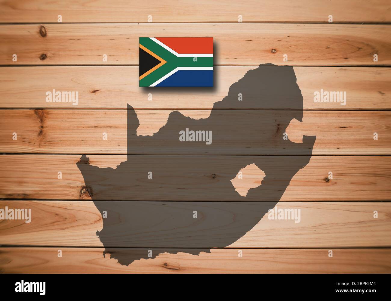 Map and flag of South Africa on a wooden background, 3D illustration ...