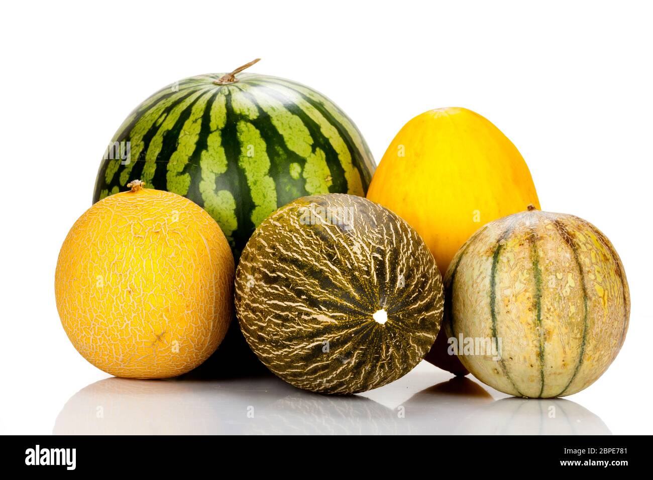 Verschiedene reife Melonensorten gespiegelt und isoliert vor weißem Hintergrund Stock Photo