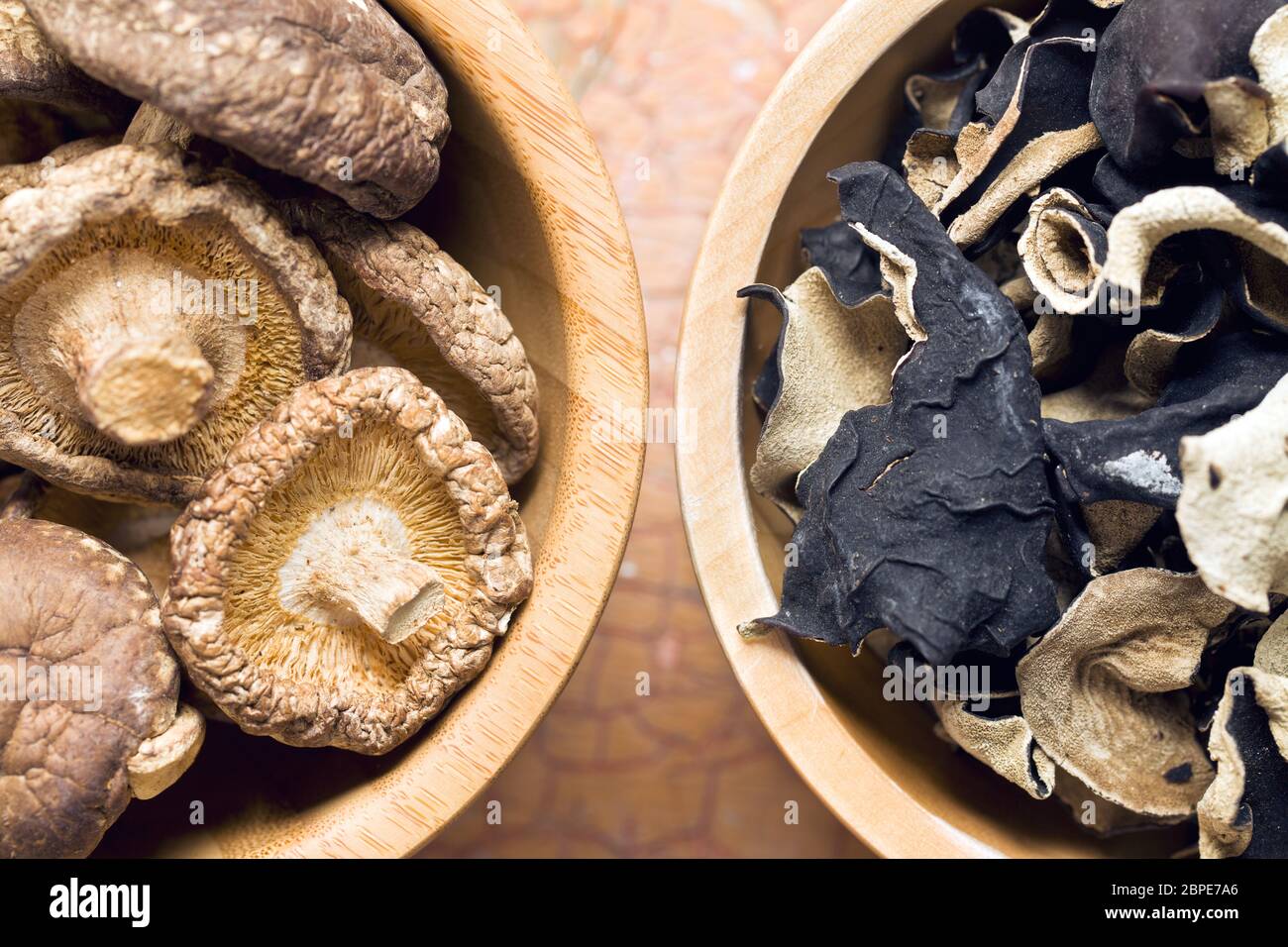 jelly ear and shiitake mushrooms in wooden bowls Stock Photo Alamy