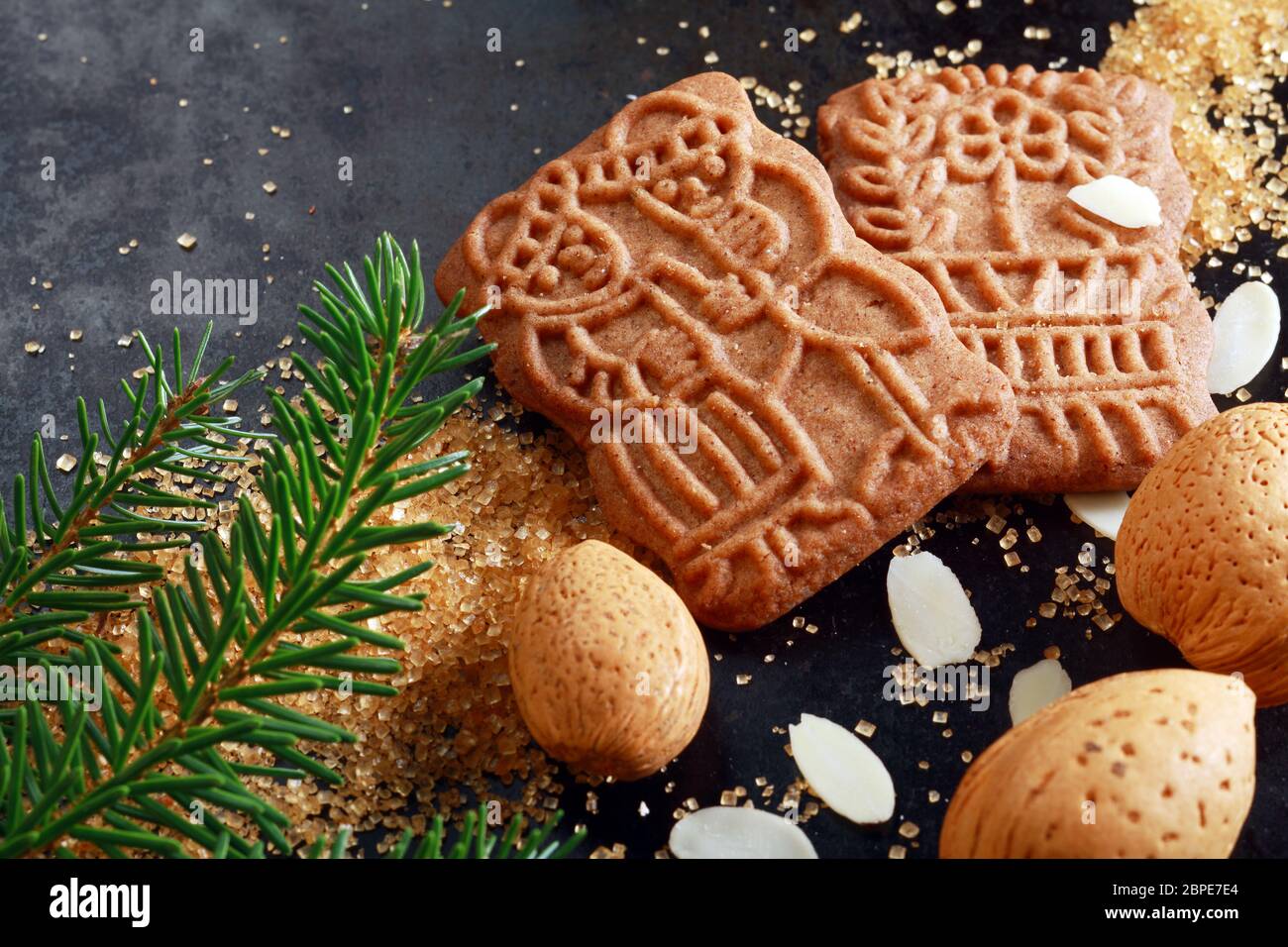 Spicy crunchy speculoos Christmas biscuits, a Dutch speciality confectionery originally baked for the feast of St Nicholas and decorated with religiou Stock Photo
