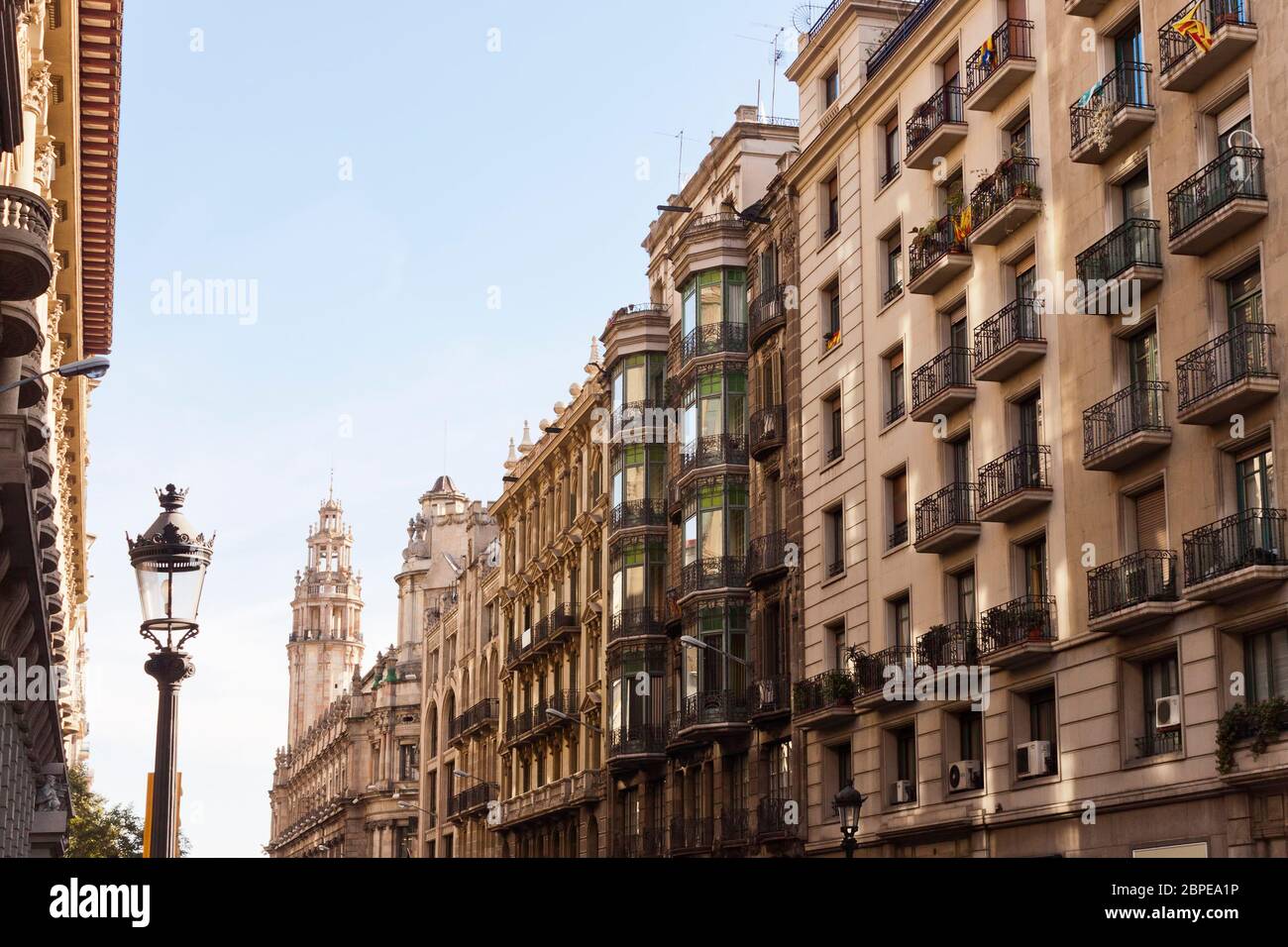 Via Laietana, a major thoroughfare in Barcelona, Catalonia, Spain in the Ciutat Vella district. Differents architectural styles buildings and the post Stock Photo