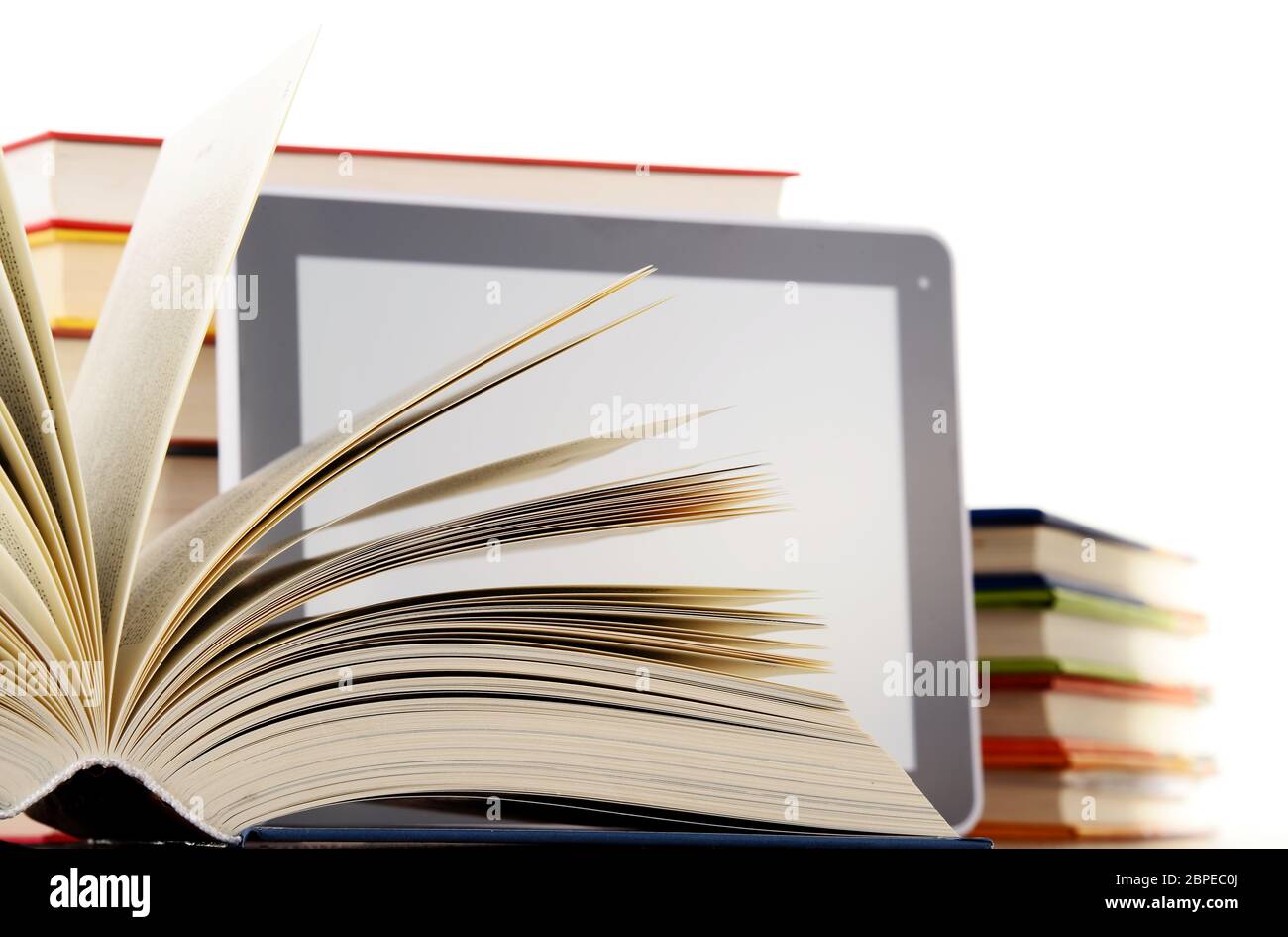 Composition with books and tablet computer isolated on white background Stock Photo